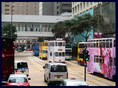 Colourful double decked trams of Central's  Des Voeux Road.
